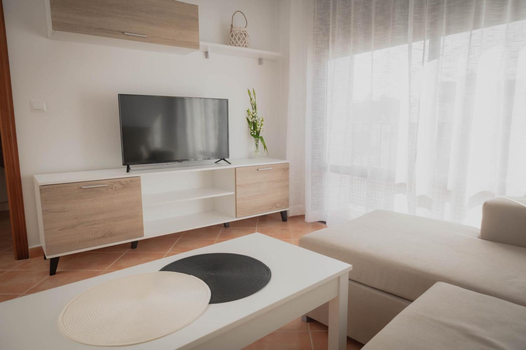 Neade Residencial Suites ซานลูการ์ เด กัวเดียนา ภายนอก รูปภาพ