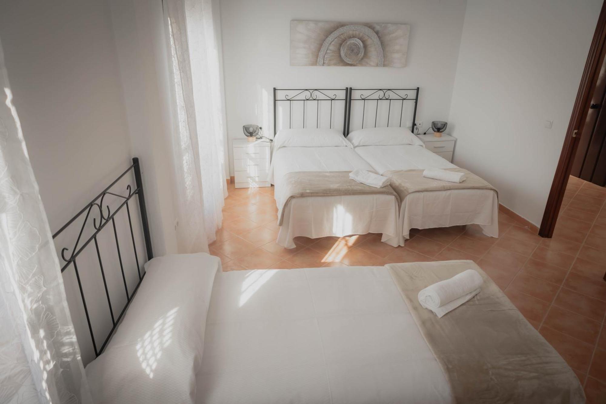 Neade Residencial Suites ซานลูการ์ เด กัวเดียนา ภายนอก รูปภาพ