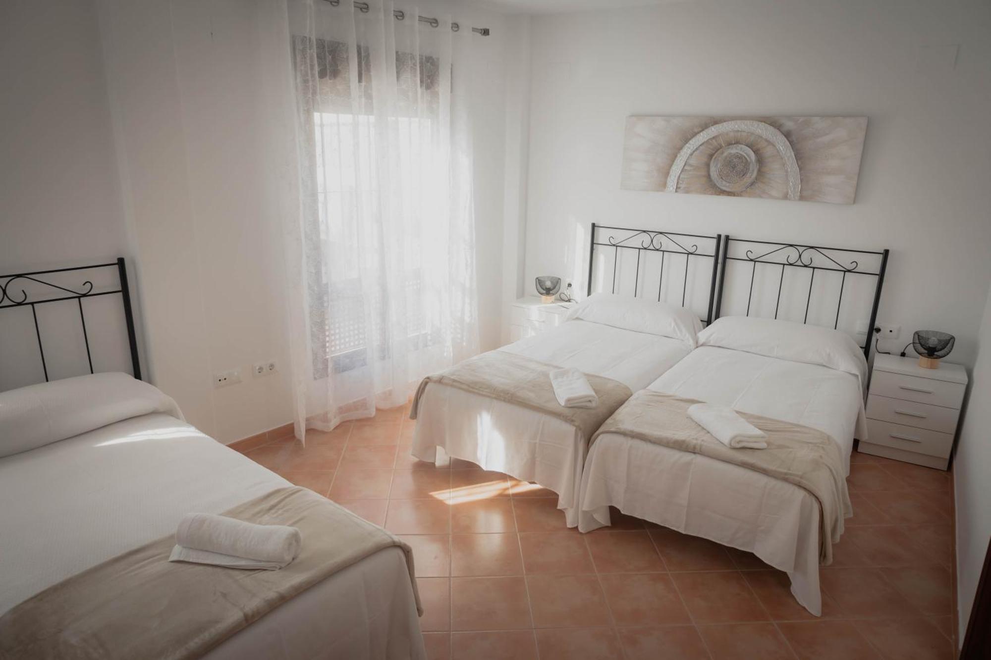 Neade Residencial Suites ซานลูการ์ เด กัวเดียนา ภายนอก รูปภาพ